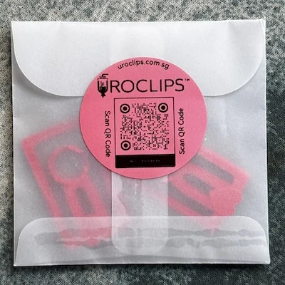 Uroclips packed in a flat mailer with fitting-guide information
